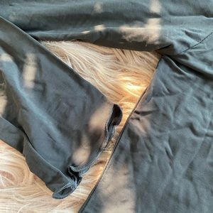 dark grey / almost black mesh mock neck